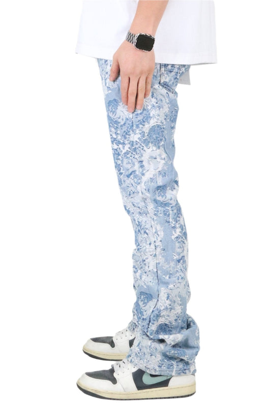 Side view of light blue jacquard denim pants showcasing a fitted style.