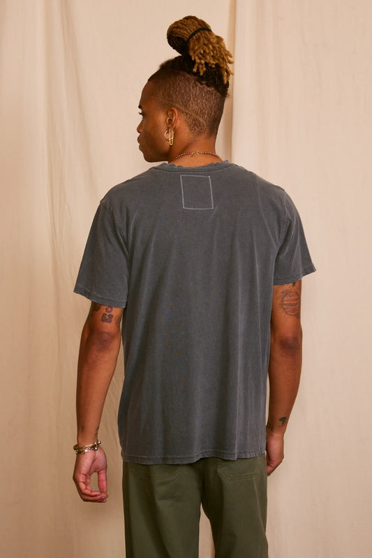 Back view of the gray graphic t-shirt with short sleeves.