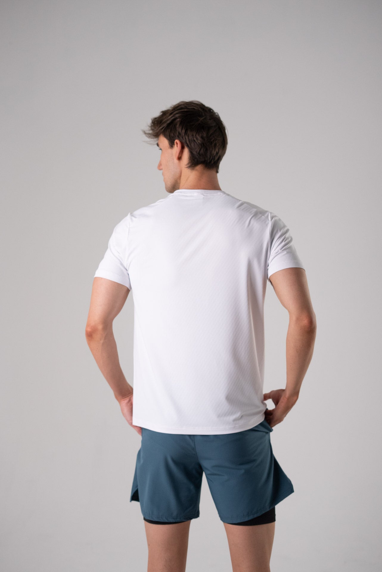 Front view of the black Alive Strong Tee with short sleeves.