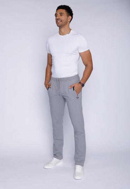 Back view of gray sweatpants featuring a zipper pocket.