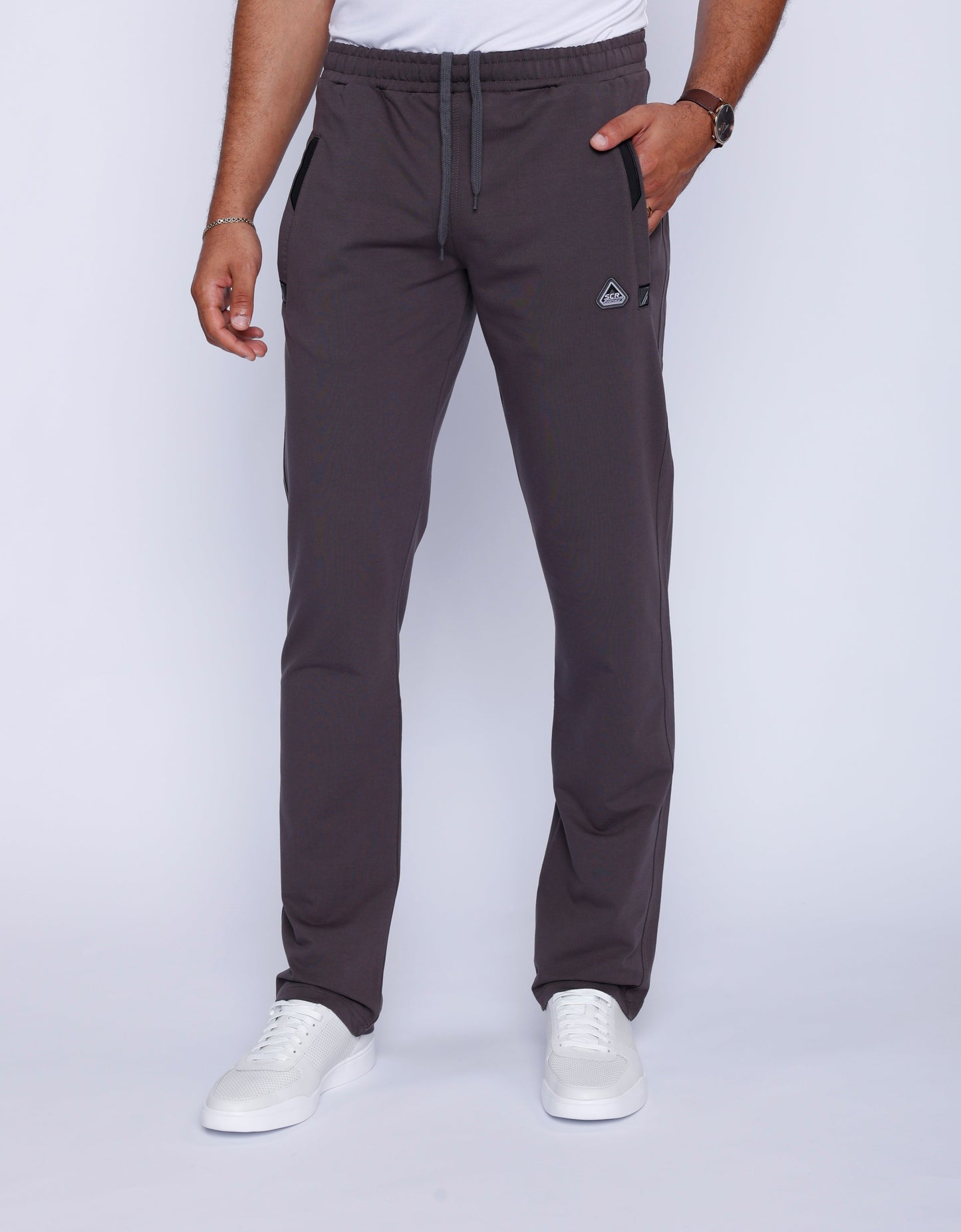 Front view of charcoal sweatpants with a 34 inseam made from a cotton blend.