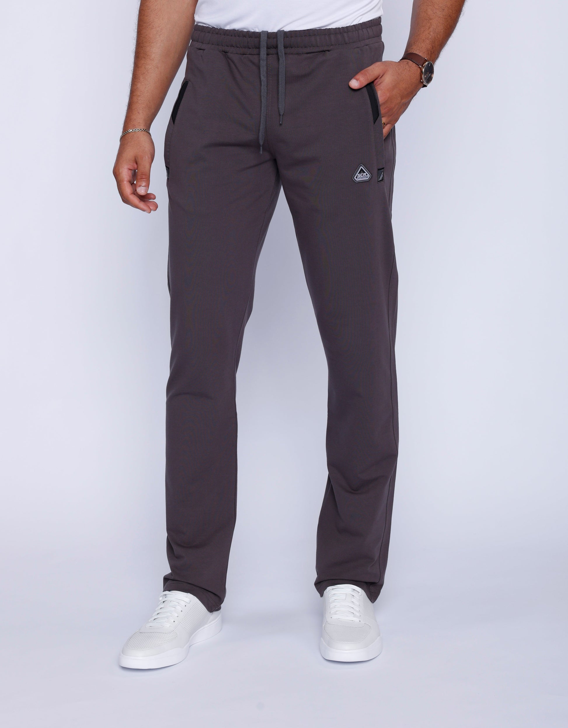 Front view of charcoal sweatpants with a 34 inseam made from a cotton blend.