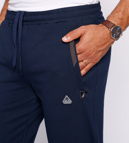 Detail shot of navy comfort pants featuring Oeko-Tex certification.