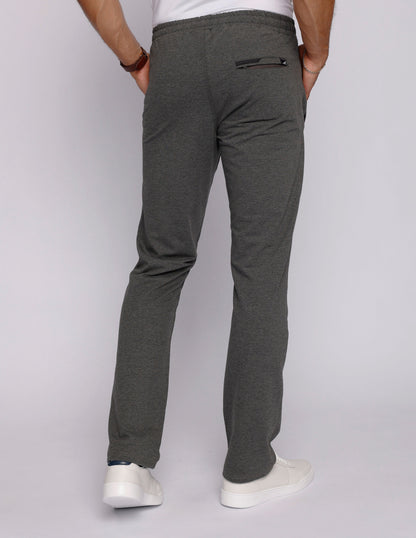 Back view of men's gray sweatpants highlighting a slim fit and back pocket.