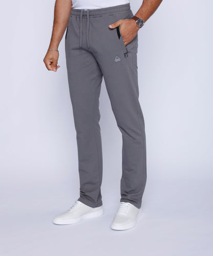 Side view of grey athletic pants showcasing slim fit and pockets.