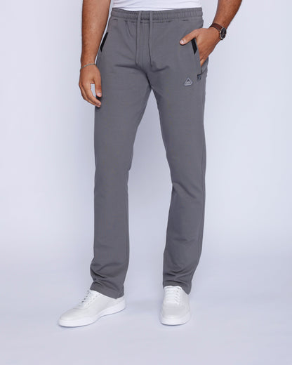 Side view of grey sweatpants highlighting straight fit and cotton blend.