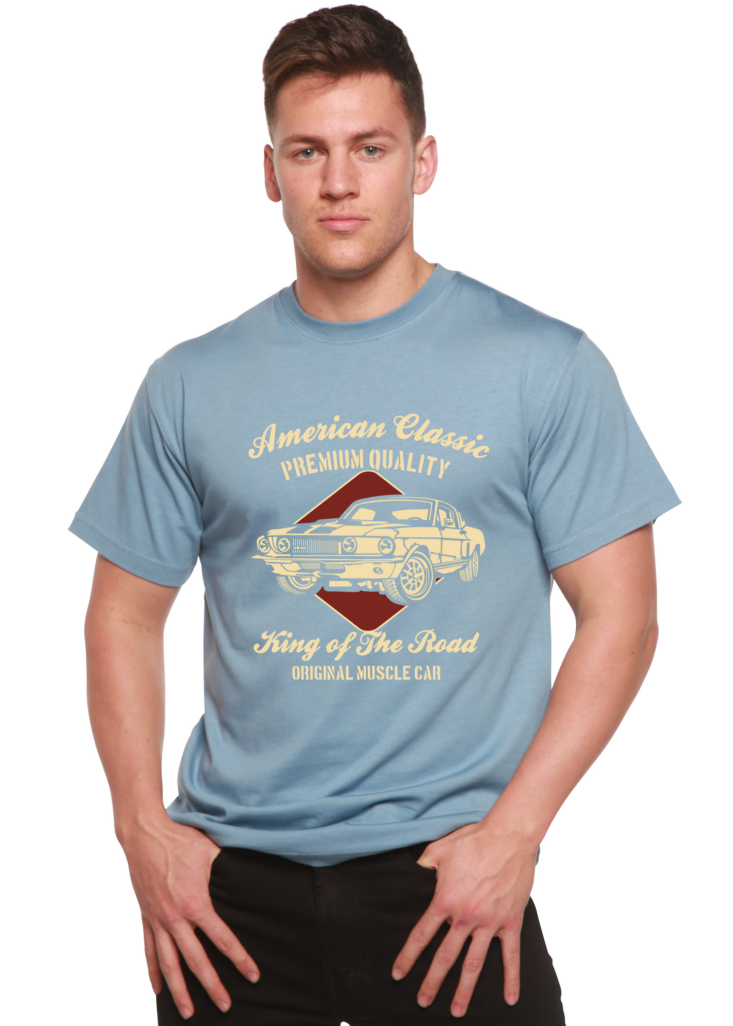 Lifestyle shot of the blue graphic t-shirt with gold print.