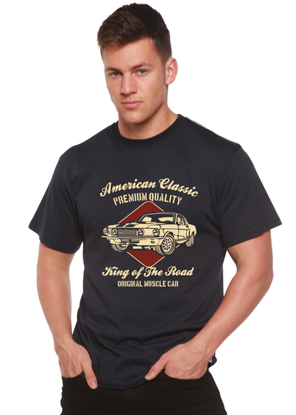 Lifestyle shot of the navy graphic t-shirt with gold print.