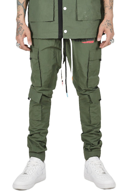 Front view of the green cargo pants with multiple pockets