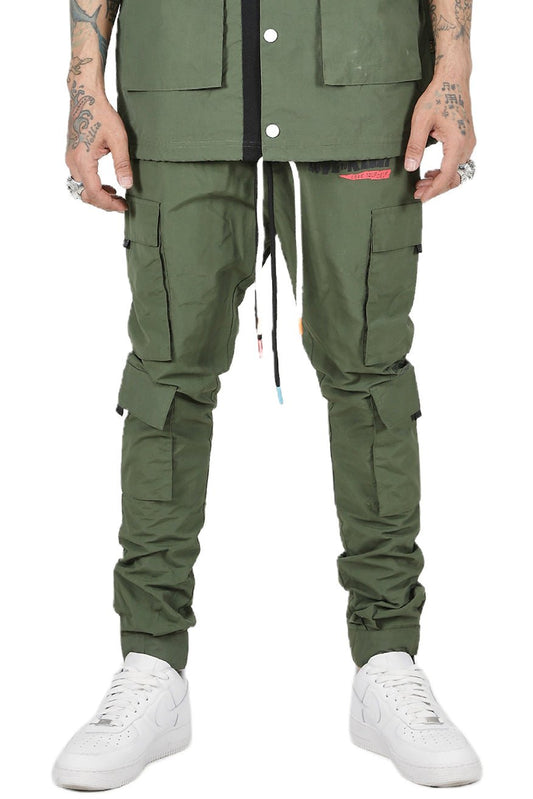 Front view of the green cargo pants with multiple pockets