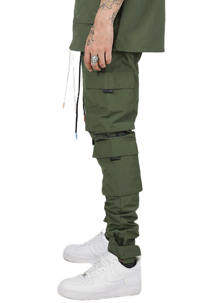 Side view of the green cargo pants showcasing slim fit and elastic cuffs