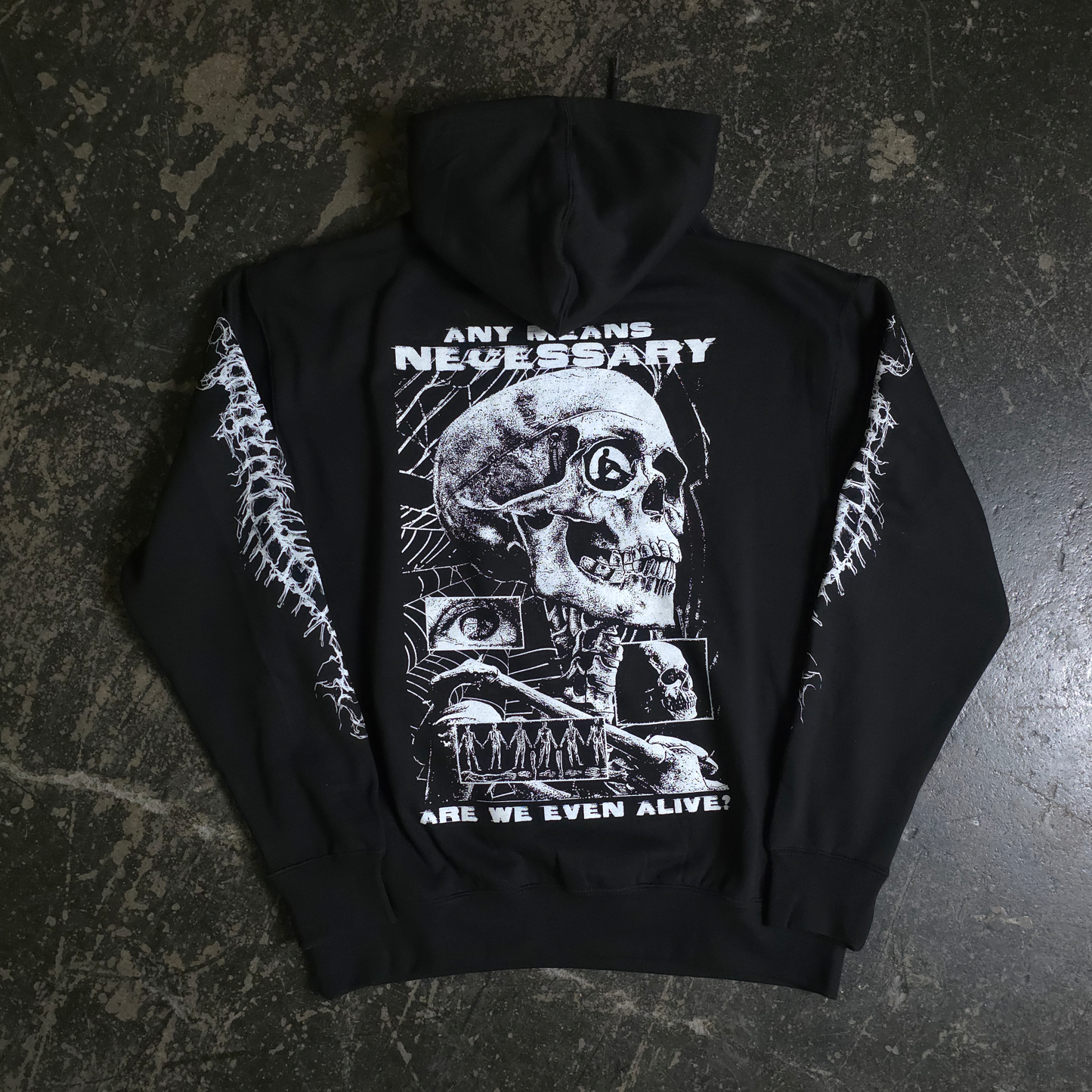 Back view of the black hoodie featuring a graphic print and hood