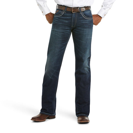 Ariat M5 Slim Stretch Coltrane jeans in blue, front view on a white background.