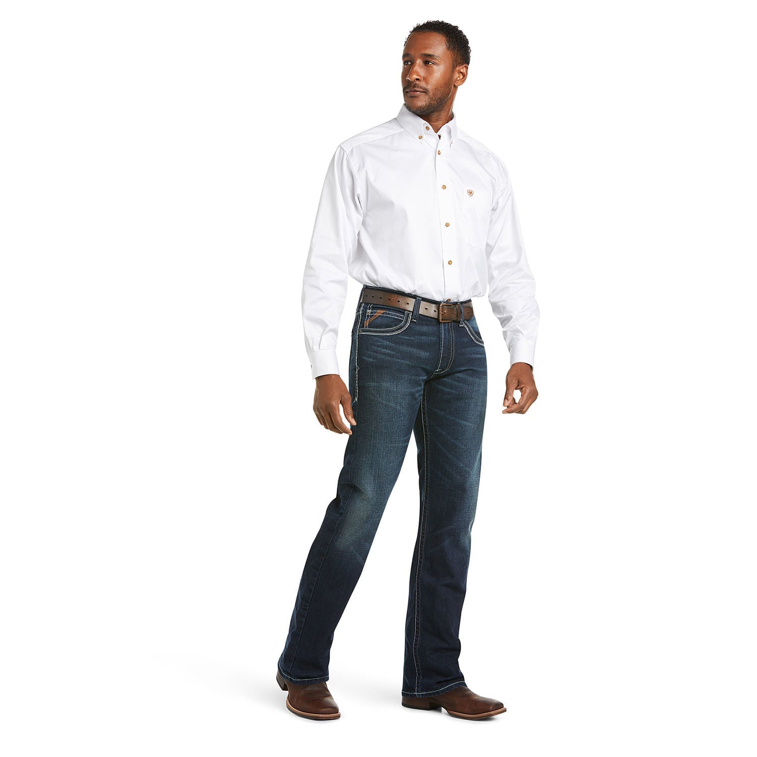 Ariat M5 Slim Stretch Coltrane jeans in blue, lifestyle shot of a man in a studio.