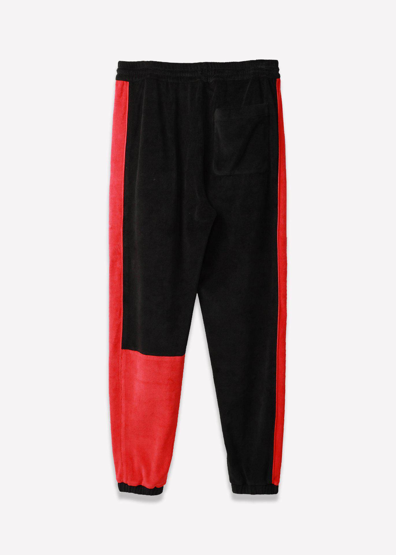 Front view of black joggers featuring elastic waistband and tapered leg.