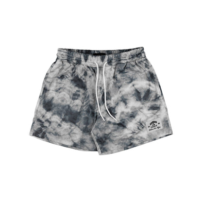 Front view of the tie-dye shorts in grey and black with a high-waisted design.
