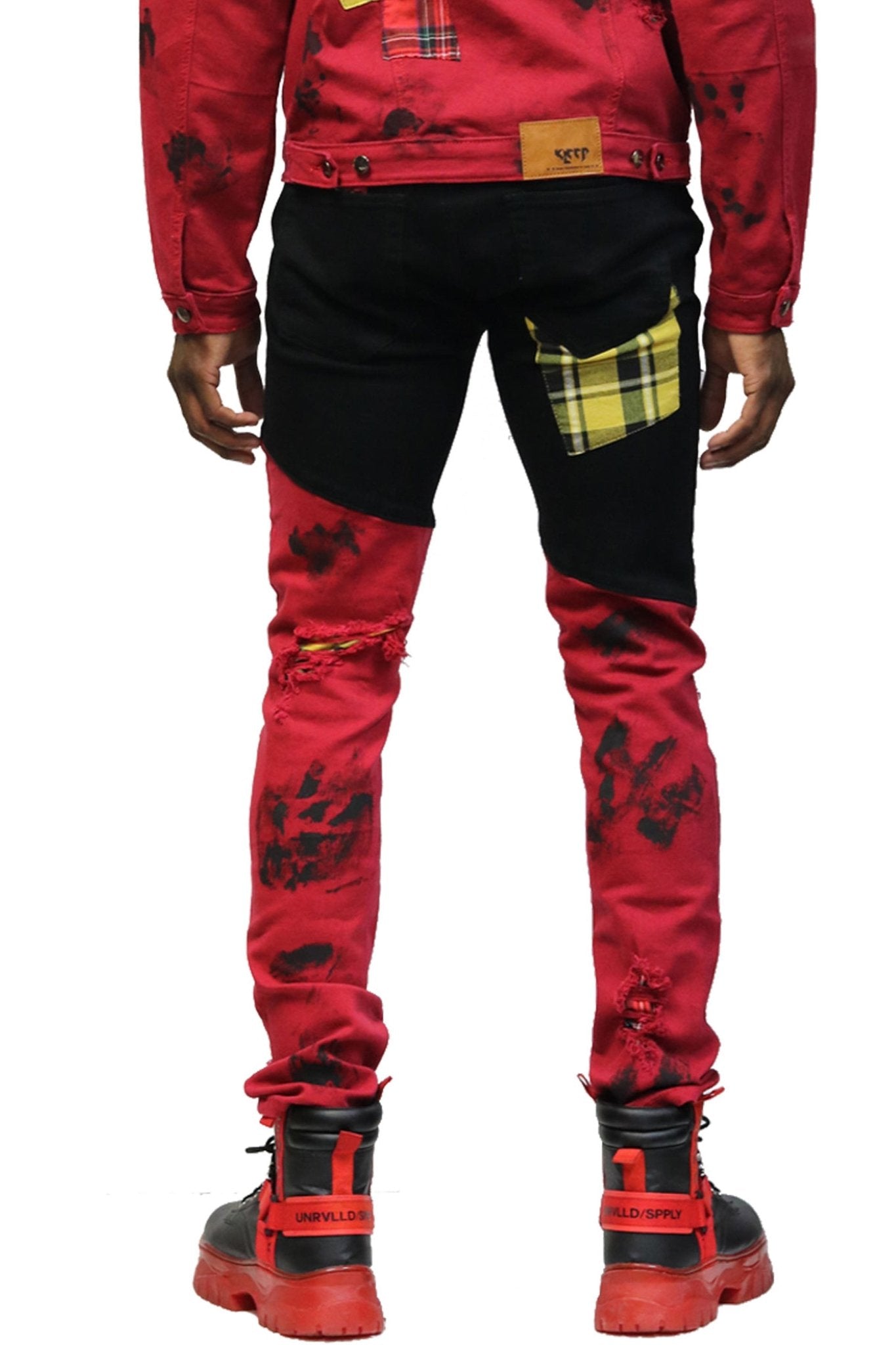 Back view of the black and camo washed skinny pants displaying the unique embroidery detail.