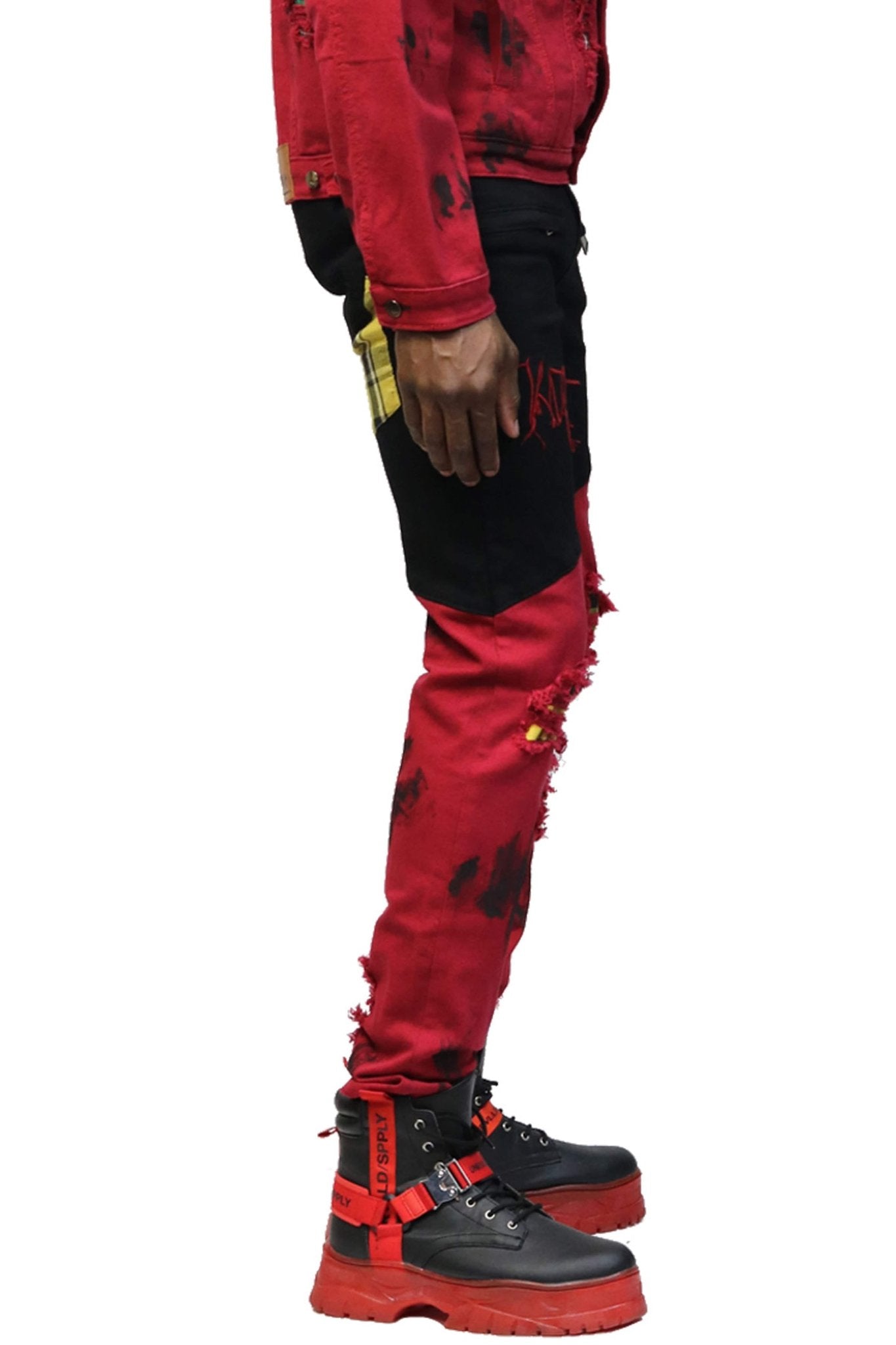 Side view of the black and camo washed skinny pants emphasizing the skinny fit and graphic print.