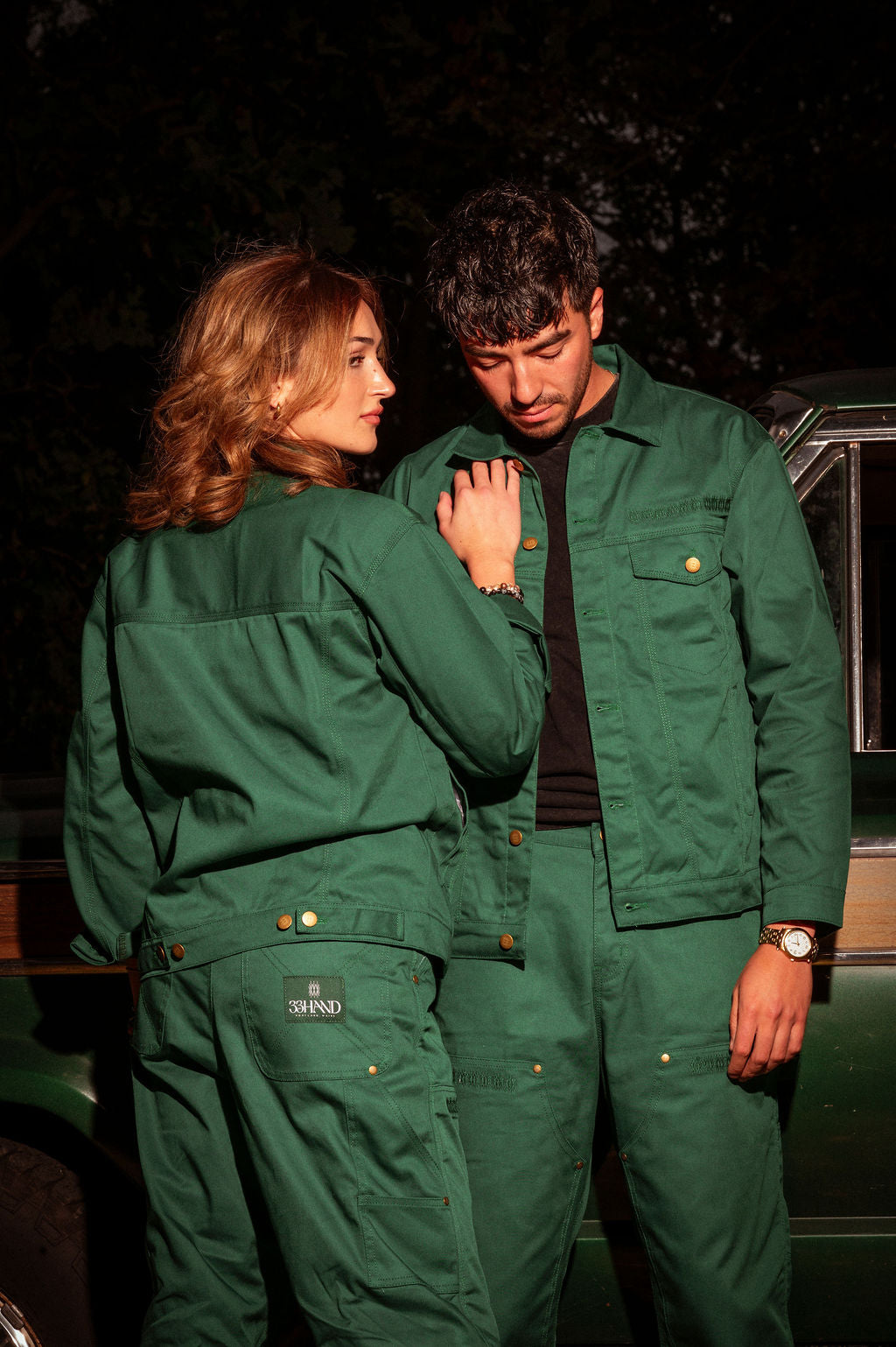 Lifestyle image of a couple in matching outfits, including the work pant.