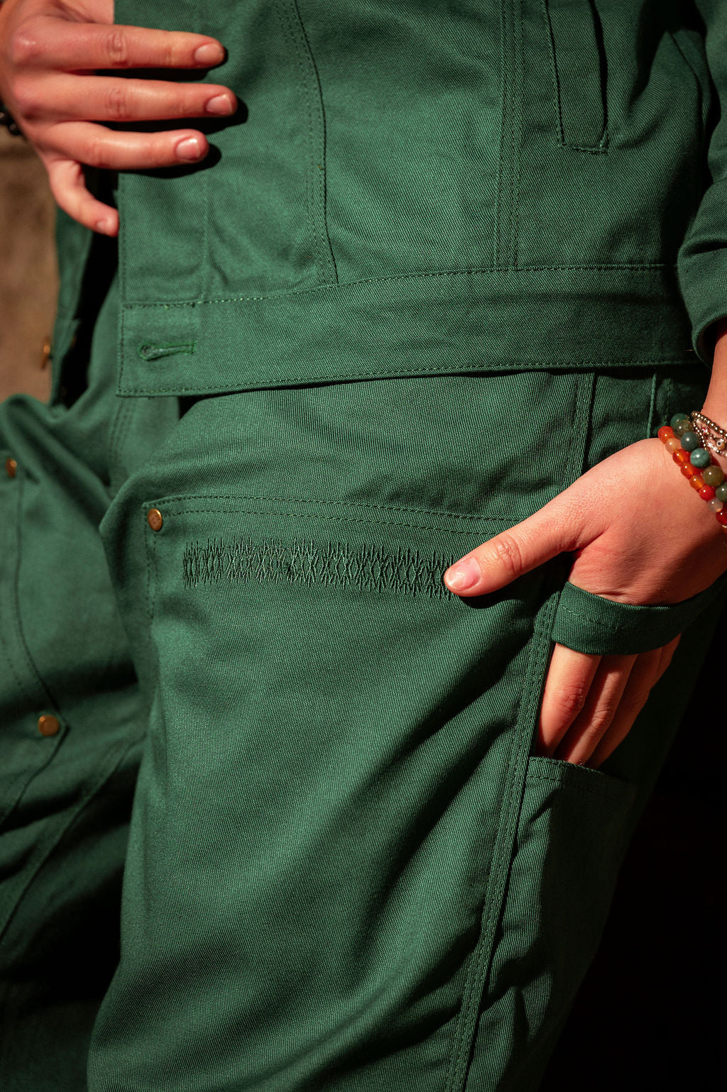 Detail view of the cotton twill work pant showcasing pocket detail.