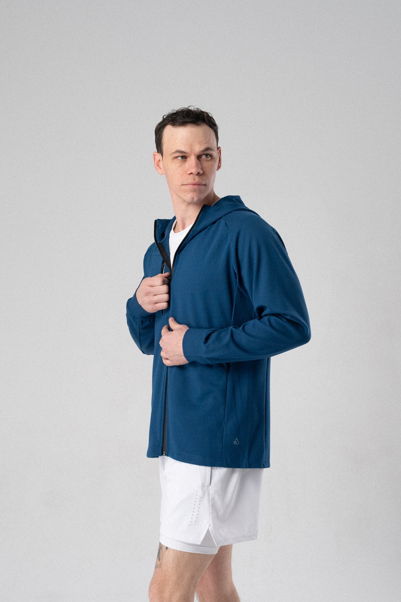 Fierce Hooded Jacket in cobalt blue, detail view showcasing fabric texture.