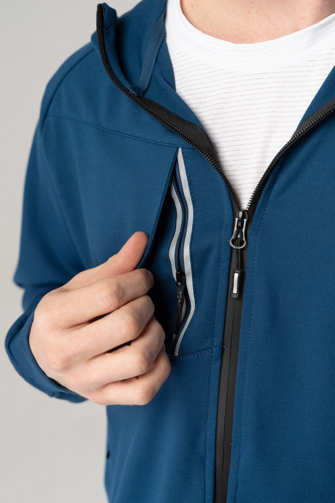 Fierce Hooded Jacket in dark grey, front view with front pockets.