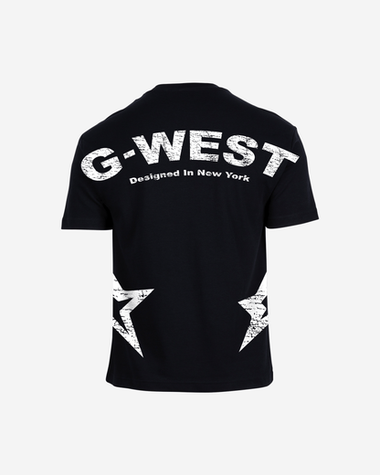 Lifestyle shot of the blue oversized t-shirt featuring G-WEST logo in a studio environment.