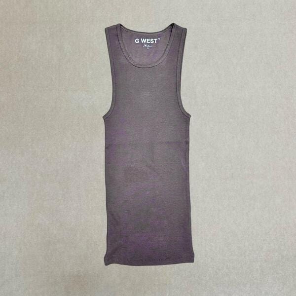 Front view of the brown oversized cotton gym tank with fitted design