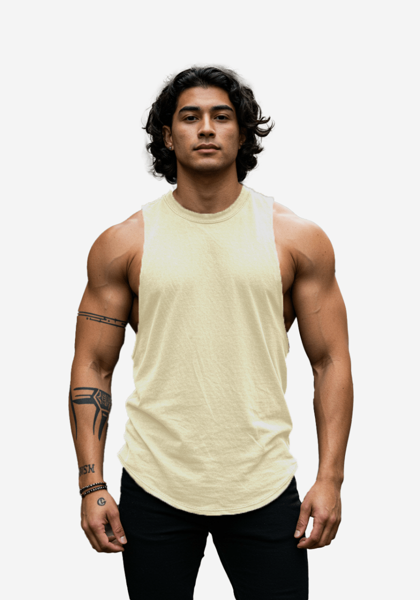 Front view of the cream oversized cotton gym tank with sleeveless design