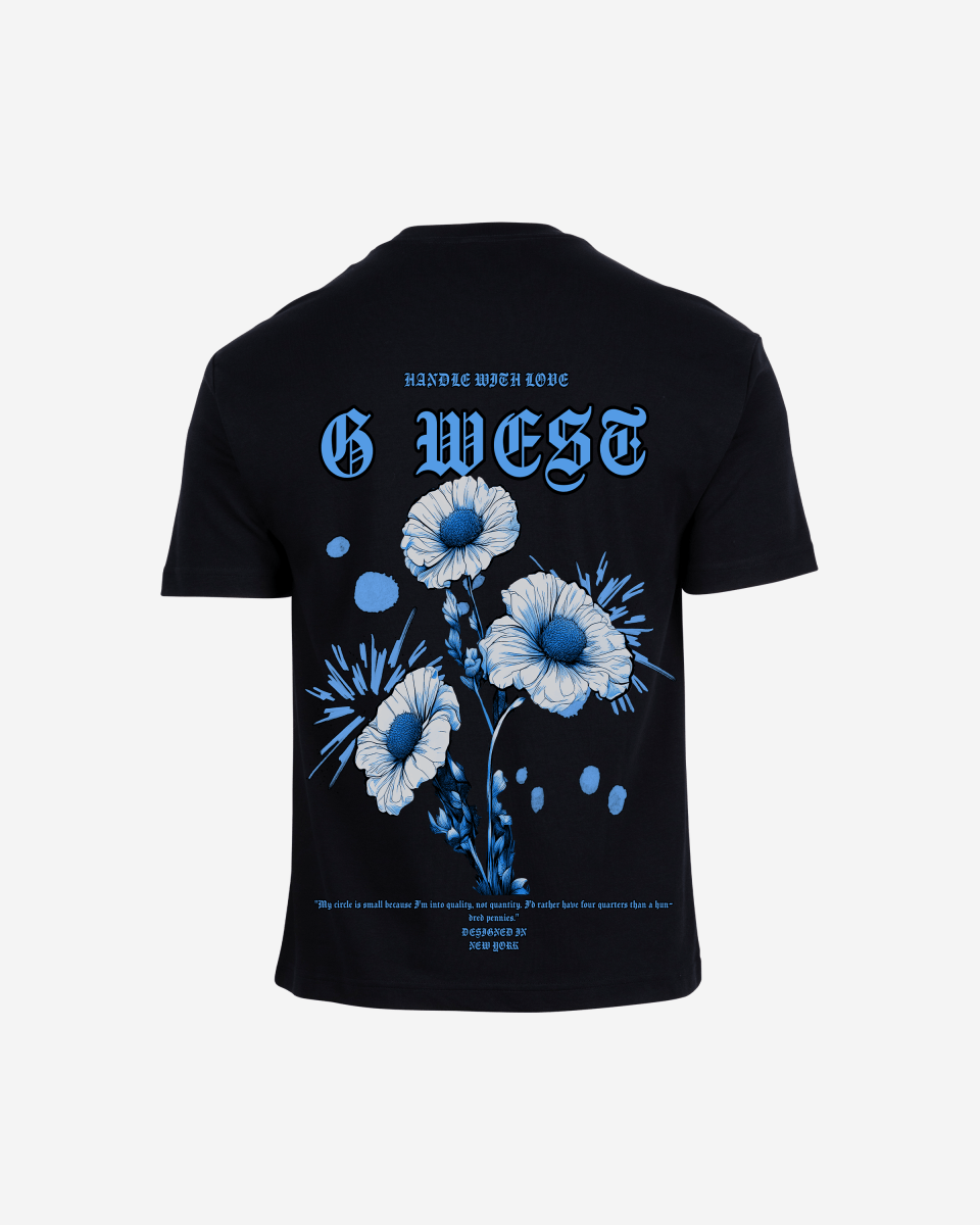 Back view of the black t-shirt featuring a floral graphic print.