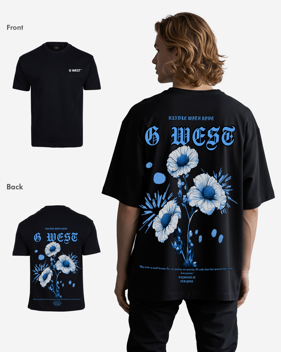 Lifestyle shot of the black oversized t-shirt with a floral design.