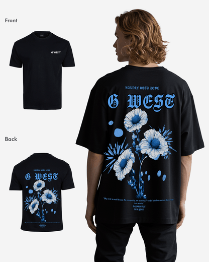 Lifestyle shot of the black oversized t-shirt with a floral design.