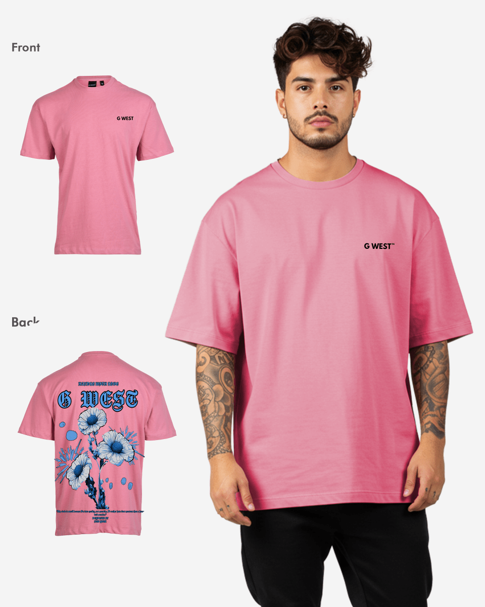 Lifestyle view of the pink oversized t-shirt featuring a front logo.
