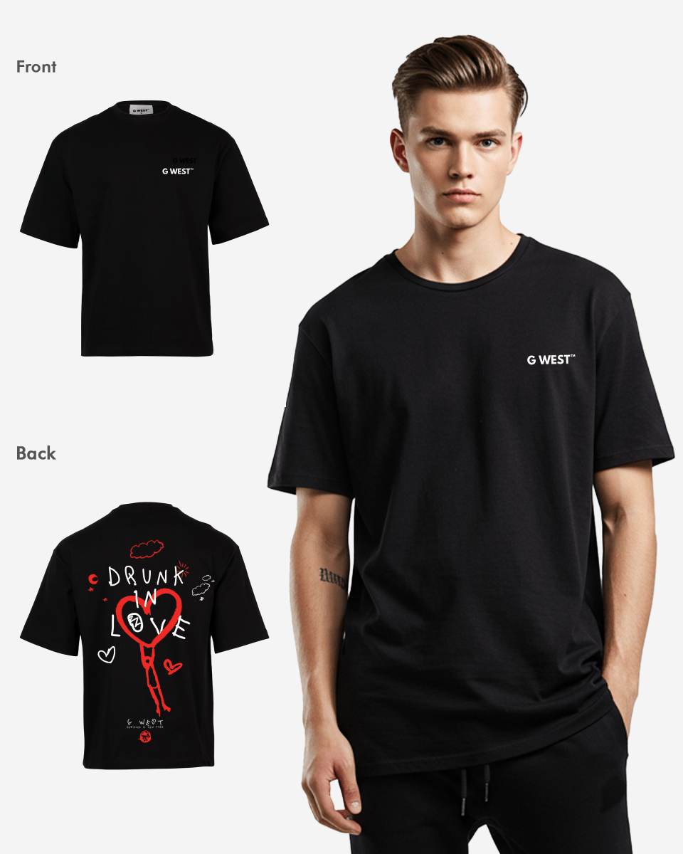 Lifestyle shot of the black oversized t-shirt featuring front logo and back graphic.