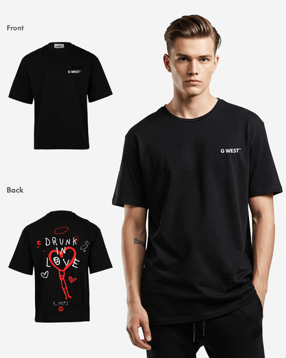 Lifestyle shot of the black oversized t-shirt featuring front logo and back graphic.