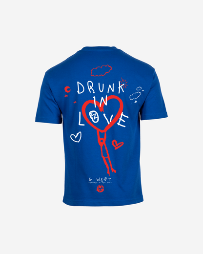 Back view of the blue oversized tee featuring a graphic print.