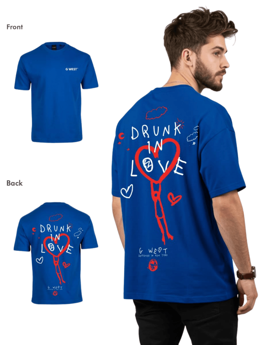 Back view of the blue oversized tee with a graphic design.
