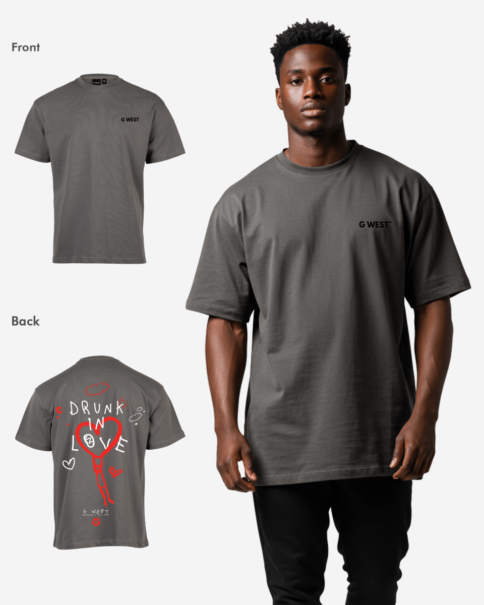 Front view of the charcoal oversized t-shirt displaying graphic print and short sleeves.