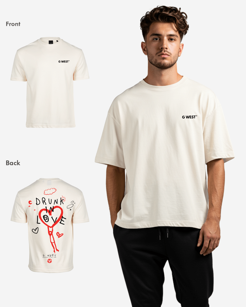 Back view of the cream oversized tee with a graphic print.