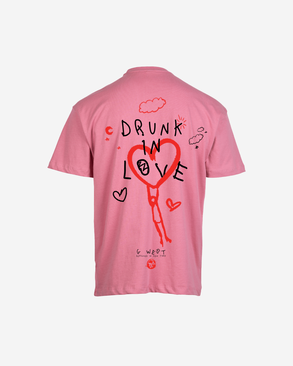 Back view of the gray oversized t-shirt featuring heart graphic and text design.