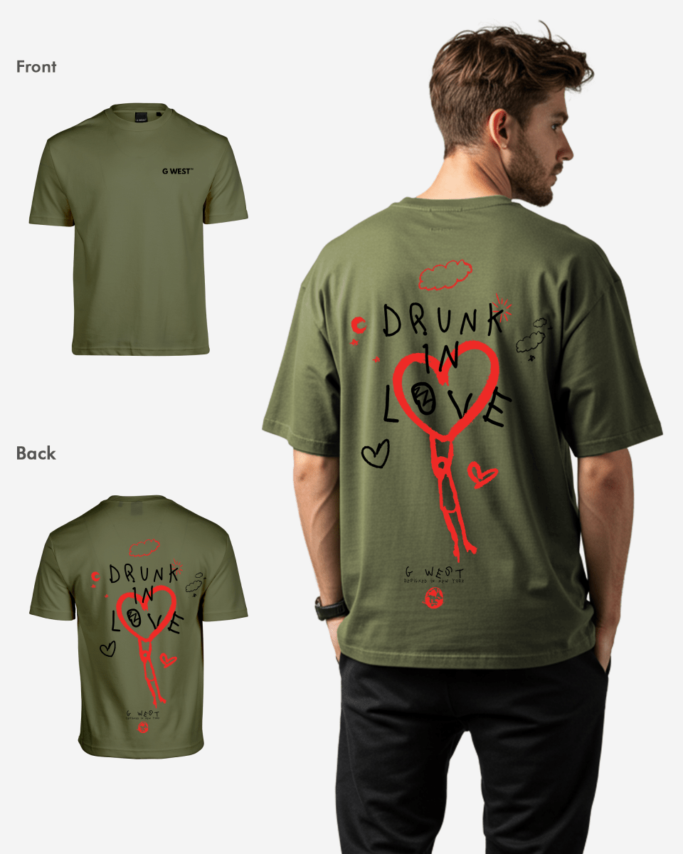 Back view of the olive green oversized tee featuring a graphic print.