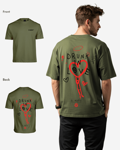 Back view of the olive green oversized tee featuring a graphic print.