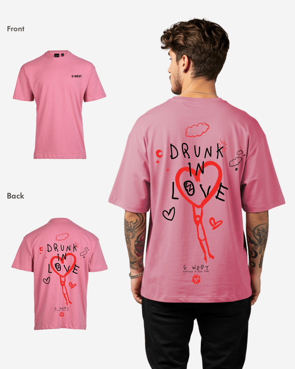 Back view of the pink oversized t-shirt with heart graphic and text design.