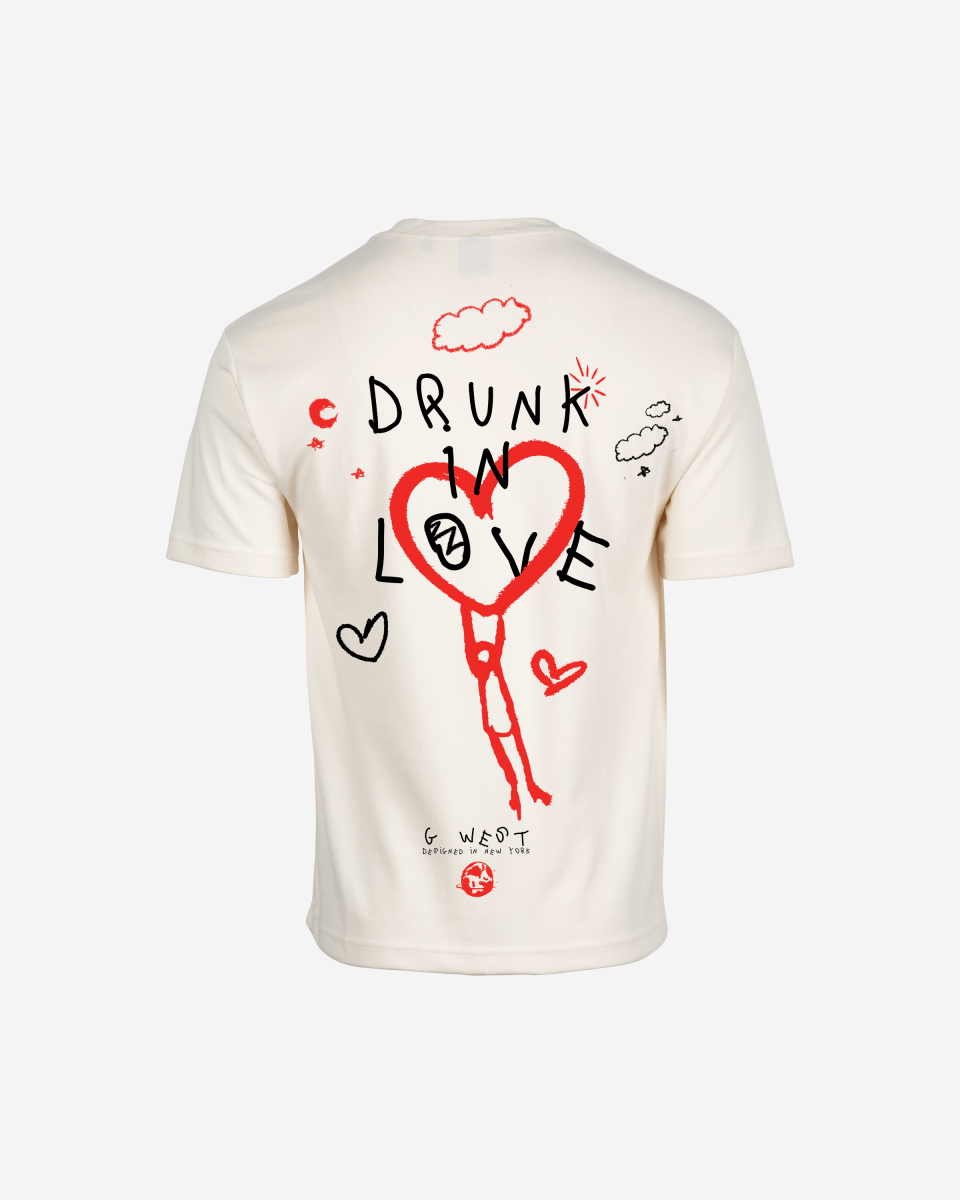 Back view of the white oversized tee featuring a graphic design.