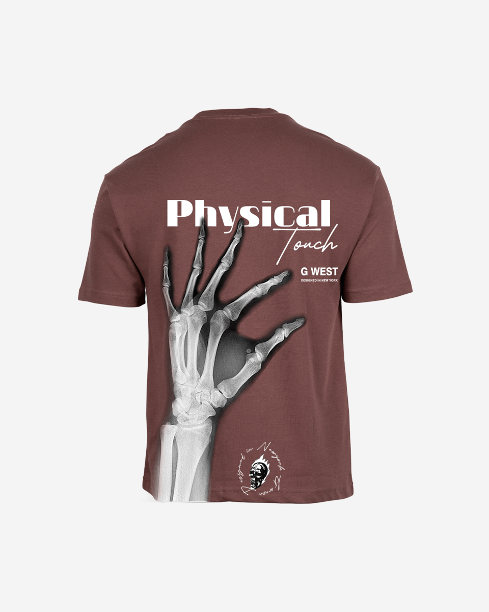 Model in black oversized tee showcasing x-ray hand graphic, lifestyle shot.