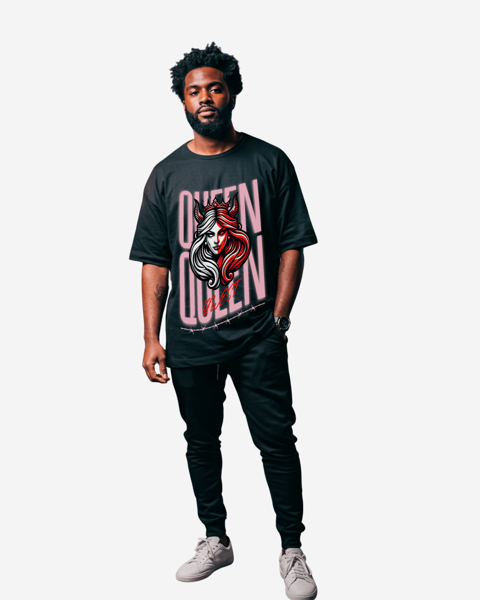 Black oversized t-shirt with graphic print in a lifestyle shot on a white background.