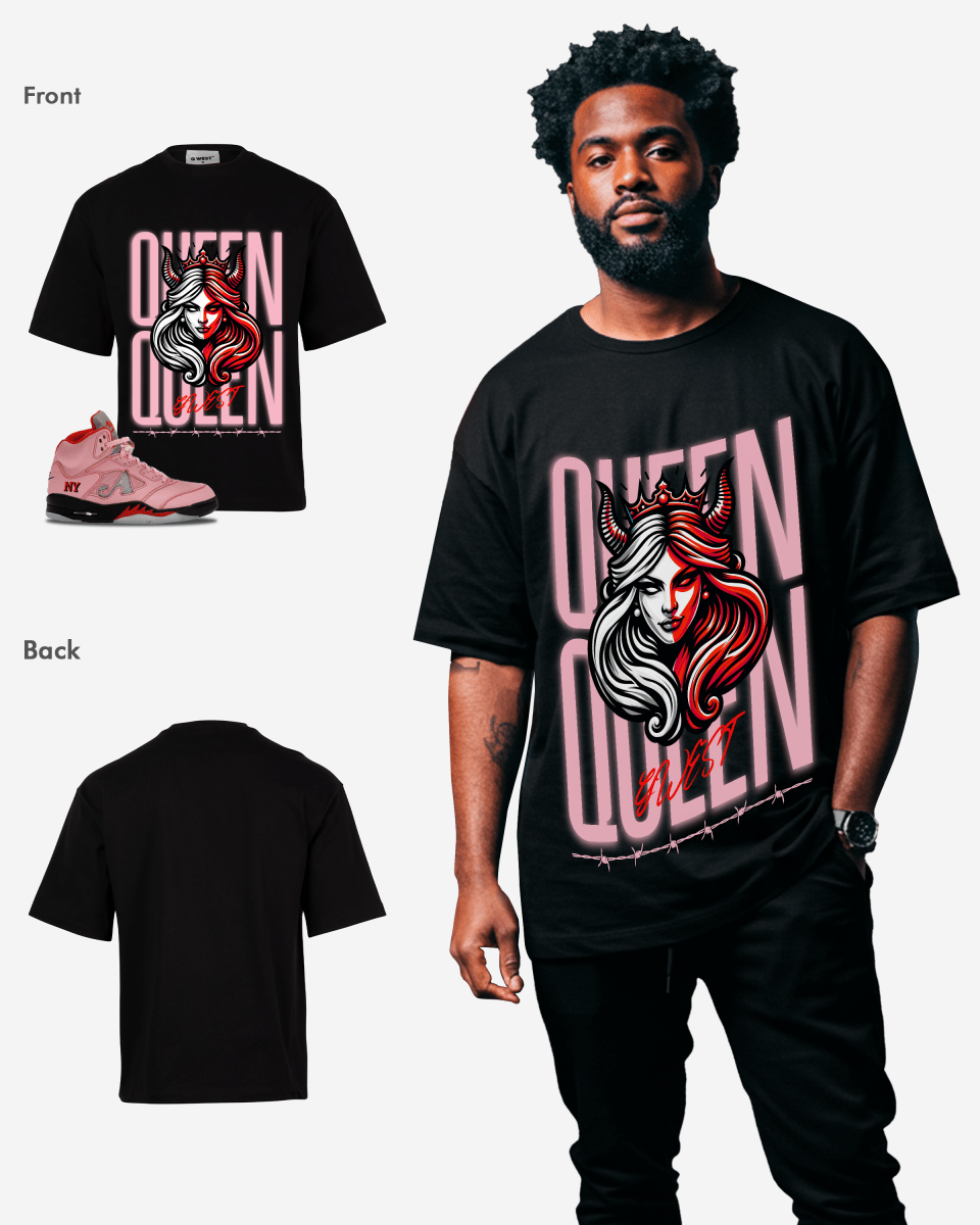 Black oversized t-shirt showcasing loose fit and graphic design in a lifestyle shot on a white background.