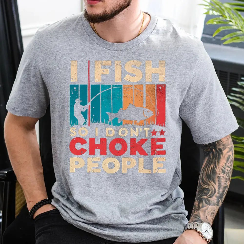 Gray t-shirt featuring graphic text in a lifestyle view.