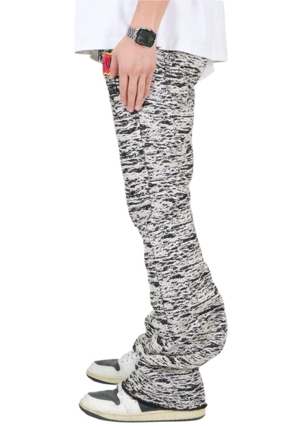Back view of the black and white jacquard pattern loose fit denim pants.