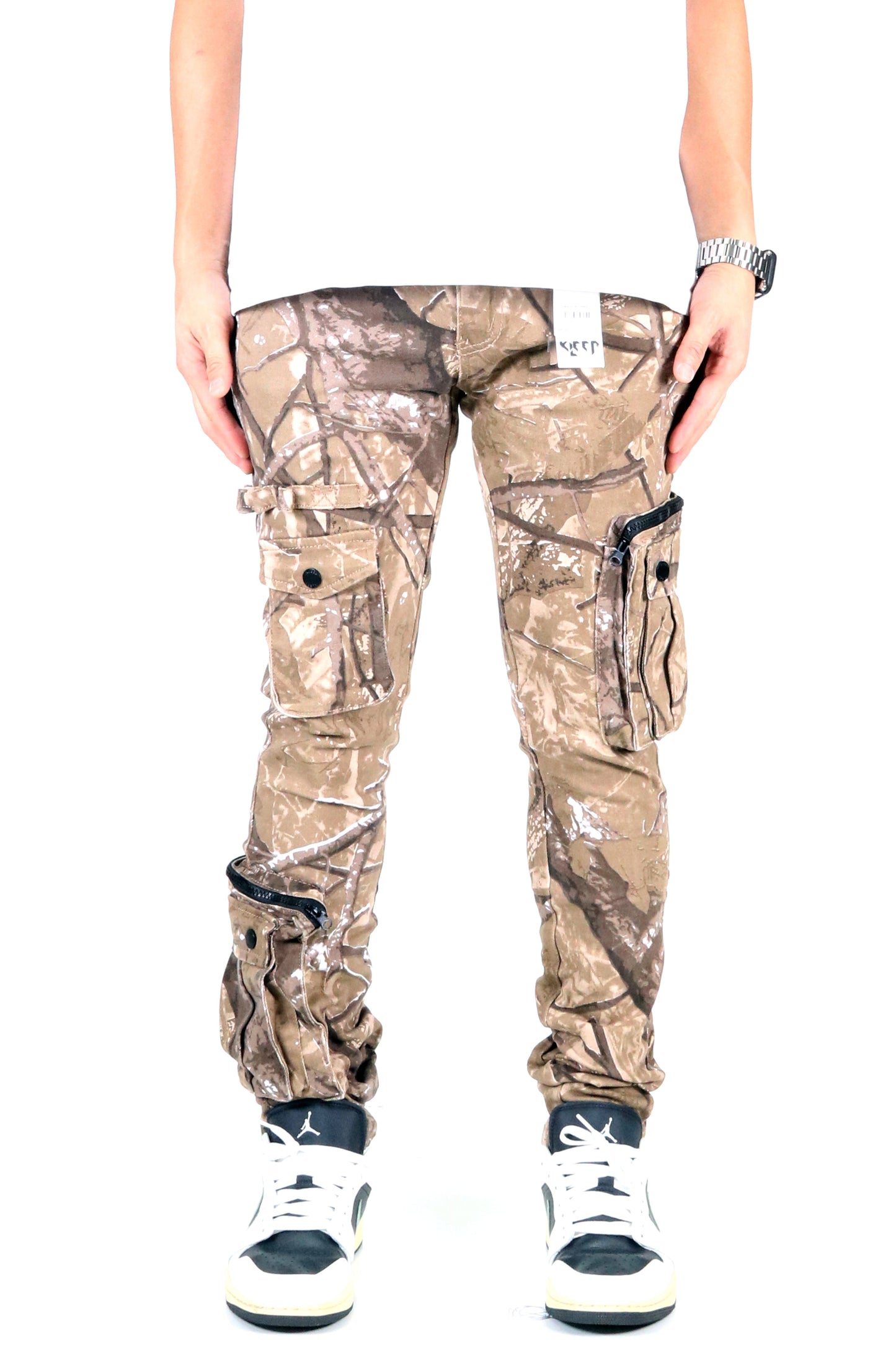 Front view of the brown and green camo cargo pants with cargo pockets.